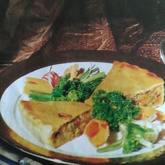 A picture of Stuffed cheesy veg. pie.
