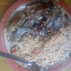 A picture of Native rice with  smoked fish.