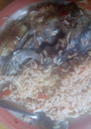 A picture of Native rice with  smoked fish.