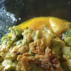 A picture of Ridged gourd Potato poppy seeds curry (jhinge aaloo posto).