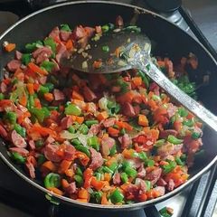 A picture of Stir fry Sausage and veggies.