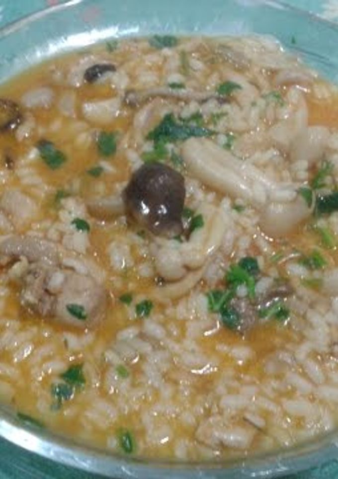 Una foto de Arroz caldoso con setas