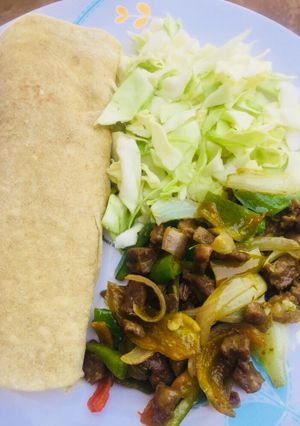 A picture of Homemade Flour Tortillas And Beef Fajitas.