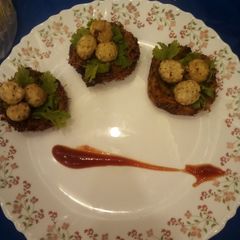 A picture of Aloo paneer bird nest.