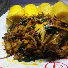 A picture of Boiled plantain with ugba sauce and smokedfish.