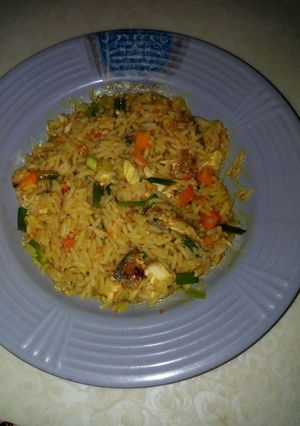 A picture of Jellope Rice with fish.