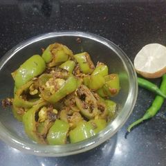 A picture of Hari mirch ke Tipore(lnstant Green chilli pickle).