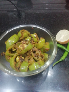 A picture of Hari mirch ke Tipore(lnstant Green chilli pickle).