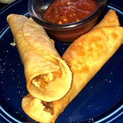 A picture of Chicken & cheese taquitos (rolled chicken tacos).
