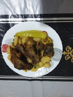 صورة لوصفة ضلع خروف مشوي في الفرن(المصلي)