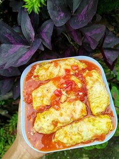 Hình của món Cải thảo cuộn thịt sốt cà chua.