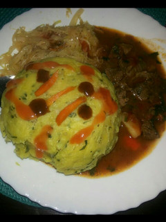 A picture of Mokimo,mbuzi stew and cabbage.