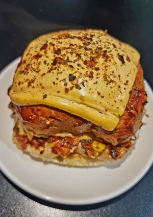 A picture of Domino's style veg premium burger pizza.