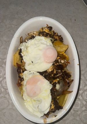 Una foto de Patatas revueltas con morcilla