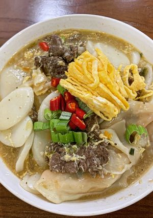 Hình của món Súp Tteokbokki màn thầu - 떡만두국.