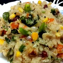 A picture of Rava Upma with corn and vegetables.