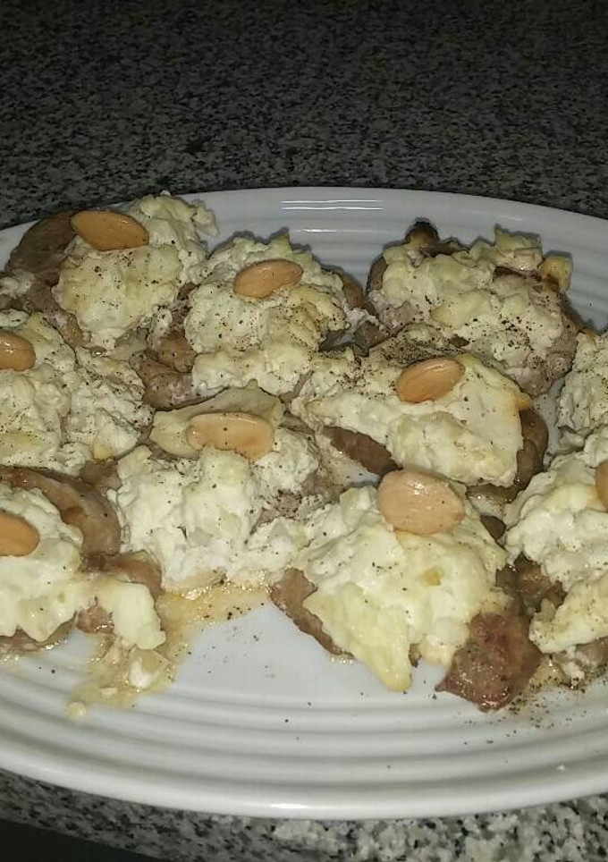 Una foto de Solomillo de cerdo con queso fresco y crujiente de Navidad