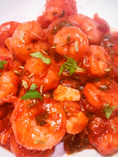 Una foto de Gambitas en salsa tandoori de tomate