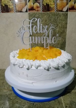 Una foto de Pastel de 3 leches de durazno