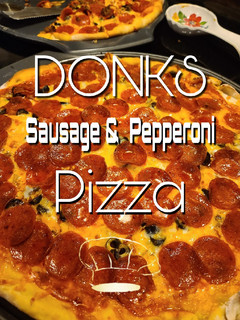 A picture of Sausage & Pepperoni Pizza.