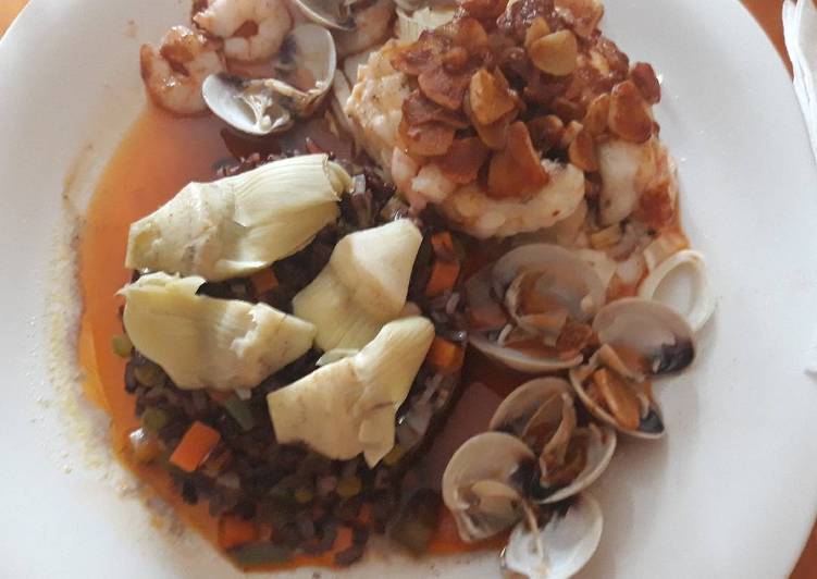 Rape a la Donostiarra con guarnición de arroz negro VENERE