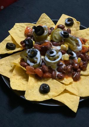A picture of Nachos with Spicy beans.