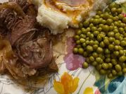 A picture of steamed potatoes and red onions
