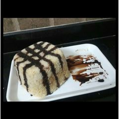 A picture of Eggless Vanilla tutti fruitti cake.