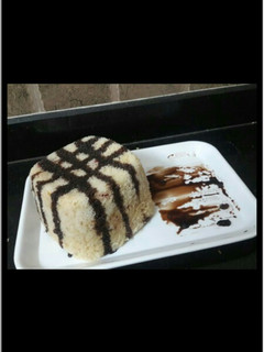 A picture of Eggless Vanilla tutti fruitti cake.