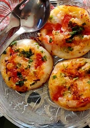 A picture of Mini Tomato Uttapum.