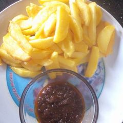 A picture of Fried Irish and tomatoes sauce.