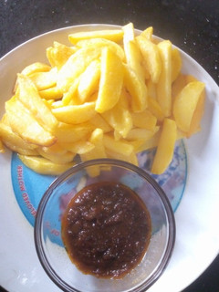 A picture of Fried Irish and tomatoes sauce.