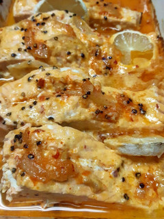A picture of Salmon in oven.