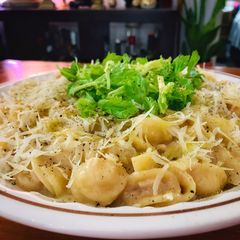 A picture of Orecchiette with potatoes, pancetta and provola.