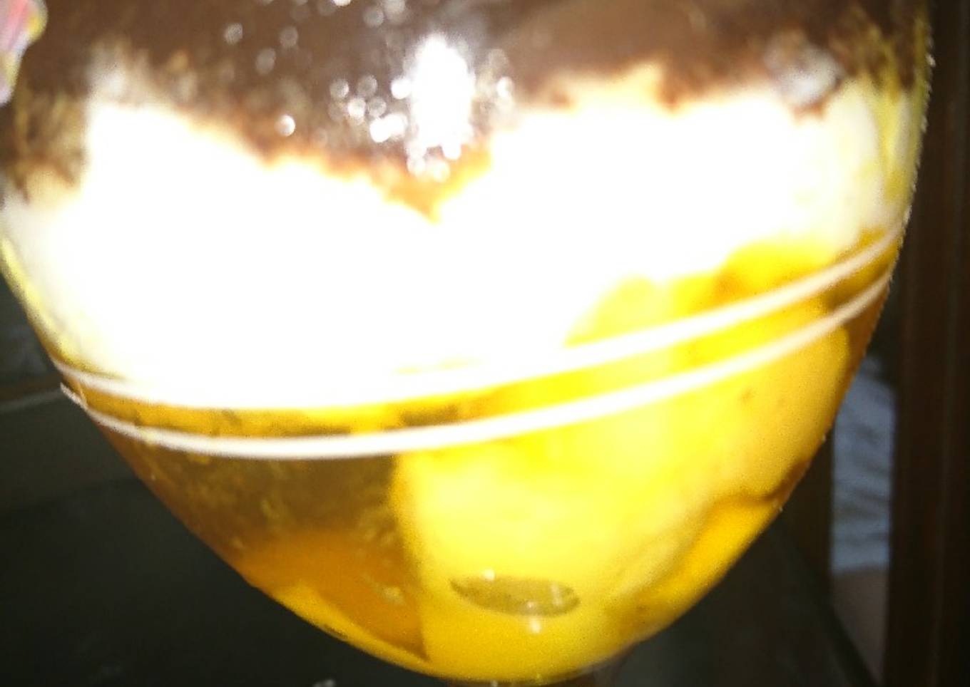 Dessert mango jelly with cream and chocolate