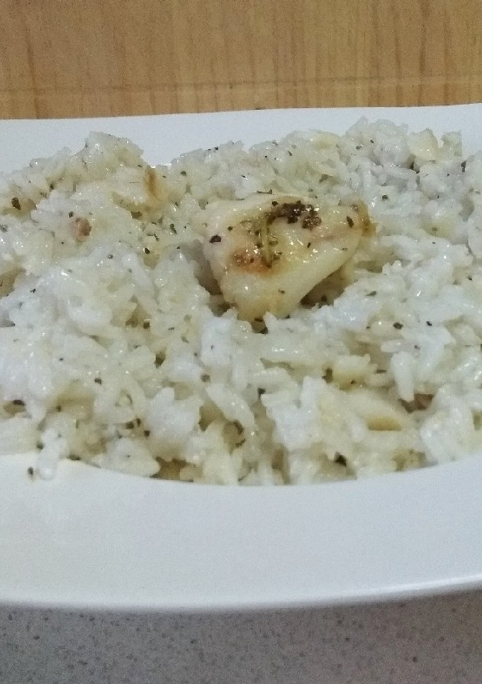 Una foto de Arroz con merluza
