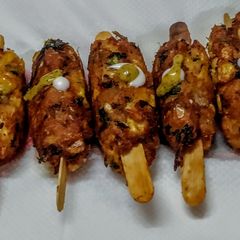 A picture of Cheesey sweet corn stick kabab.