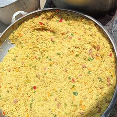 A picture of Garnished curry  jollof rice.