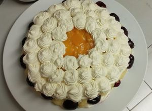 Una foto de Torta duraznos con cremas