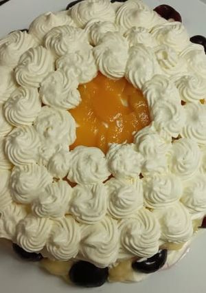 Una foto de Torta duraznos con cremas