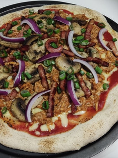 Una foto de Pizza de Pulled Pork