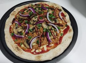 Una foto de Pizza de Pulled Pork
