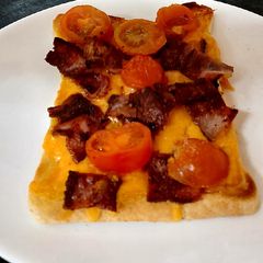 A picture of My Melted Cheese, Bacon & Tomatoes on Toast 😋#Lunch.