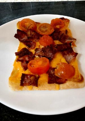 A picture of My Melted Cheese, Bacon & Tomatoes on Toast 😋#Lunch.