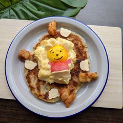 A picture of Cloud Egg and Fried Chicken Recipe [Pooh bear floats in a cloud].