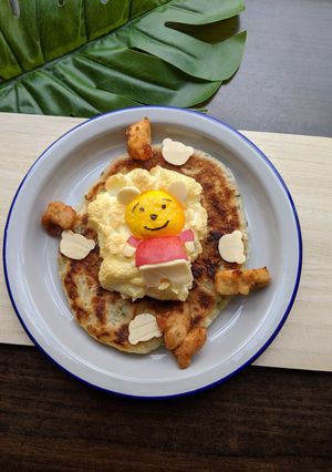 A picture of Cloud Egg and Fried Chicken Recipe [Pooh bear floats in a cloud].