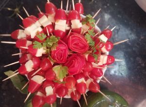 Una foto de Brochette de cherry y queso cuartirolo