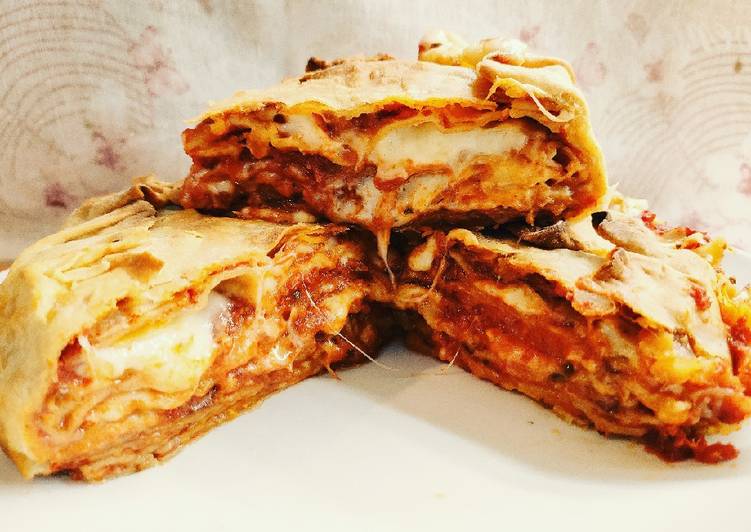 Step-by-Step Guide to Make Quick Timballo di piadine di kamut gusto pizza