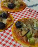 Mini pizzas de verdura y anchoas