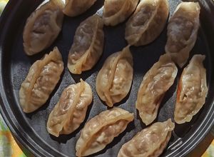 Una foto de Gyozas de confit de pato